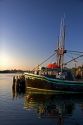 Fishing boat at sunset docked at Yarmouth, Nova Scotia, Canada.