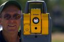 Surveyor using a laser transit in Boise, Idaho.