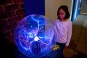 Girl looking at a Plasma Ball at Union Station Science City in Kansas City, Missouri.