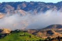 Fog lifting over the foothills and Governor's Mansion in Boise, Idaho.