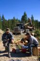Loggers having a lunch break on the job of a logging operation in the Boise National Forest, Idaho.