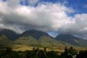 Clouds gather over mountains on the island of Maui, Hawaii.