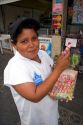 A boy selling candy on the street in the Liberdade asian section of Sao Paulo, Brazil.