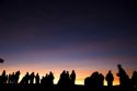 Tourists await the sunrise atop Mount Haleakala on the island of Maui, Hawaii.
