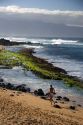 A beach scene on Maui, Hawaii at Lower Paia Beach.