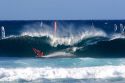 Windsurfing in the pacific ocean off the island of Maui, Hawaii.