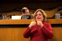 Woman translates in sign language at a meeting of Boise City Council, Idaho.