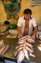 A vendor selling fish in Manaus, Brazil.