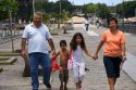 Argentine family walking and holding hands in the La Boca area of Buenos Aires, Argentina.