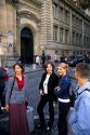 French students socialize outside the Sorbonne in Paris, France.