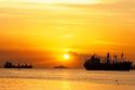 Ships at sunset in Manila Bay, Philippines.
