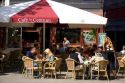 People dine at an outdoor cafe in Amsterdam, Netherlands.