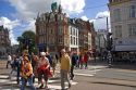 Pedestrians crossing the street in Amsterdam, Netherlands.