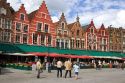 Cafes in The Big Market Square at Bruges in the province of West Flanders, Belgium.