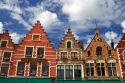 Colorful building facades in The Big Market Square at Bruges in the province of West Flanders, Belgium.