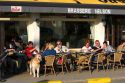 People dine at an outdoor cafe at Nieuwpoort in the province of West Flanders, Belgium.