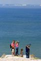 Tourists view the white cliffs of Dover in England from Cap Blanc Nez in the Pas-de-Calais department in Northern France.