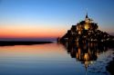 Le Mont Saint Michel at sunset in the region of Basse-Normandie, France.