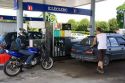 Automobiles fueling up at a gas station in Bayeux in the region of Basse-Normandie, Normandy, France.