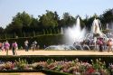 Tourists visit the formal gardens at The Palace of Versailles at Versailles in the department of Yvelines, France.