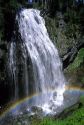 Waterfall and rainbow at Mount Rainier, Washington.