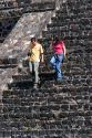 Tourists walk down the steps of the Pyramid of the Moon at Teotihuacan in the State of Mexico, Mexico.