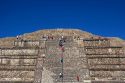 Tourists climb the steps of the Pyramid of the Moon at Teotihuacan in the State of Mexico, Mexico.