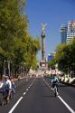 Bicyclists ride on the Paseo de la Reforma with no traffic on a Sunday in Mexico City, Mexico.