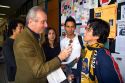 Professor speaking with students on the campus of the National Autonomous University of Mexico in Mexico City, Mexico.