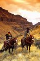 Cowboys on horseback in Southern Idaho.