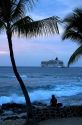 Cruise ship at sunset in the Pacific Ocean off the coast the Big Island of Hawaii.