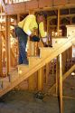 Carpenter building a stairs.