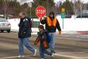 School crossing guard in the winter snow in Boise, Idaho.