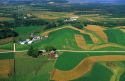 Aerial view of contour strip farming corn and alfalfa hay in Southwest Wisconsin.