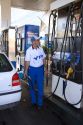 YFP gas station attendent fueling up a car in Mendoza, Argentina.