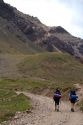 Hikers on a trail in the Andes Mountain Range, Argentina.