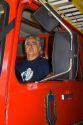 Chilean firefighter sitting in a fire truck at Valparaiso, Chile.