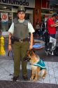 Female police officer with dog in Santiago, Chile.