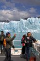 Passengers on a tour boat at the Perito Moreno Glacier located in the Los Glaciares National Park in the south west of Santa Cruz province, Patagonia, Argentina.