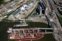 Ships docked near grain elevators along the Houston Ship Channel in Houston, Texas.