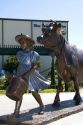 Sculpture of famous Blue Bell Cow and Girl by Veryl Goodnight at the Blue Bell Creamery in Brenham, Texas.