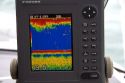 The screen of a fishfinder using sonar to measure water depth and detect fish in Lake Erie, Michigan.