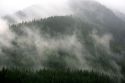 Fog and mist cover the Cascade Range near Snoqualmie Pass in Washington.