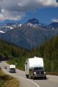 Truck hauling a large camper on Washington State Highway 20 in the North Cascade Range, Washington.