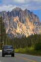 Pickup truck traveling on Washington State Highway 20 in the North Cascade Range, Washington.