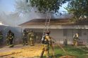 Firefighters respond to a house fire in Boise, Idaho.