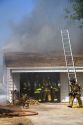 Firefighters respond to a house fire in Boise, Idaho.