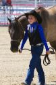 Girl showing her 4-H blue ribbon winning horse at the Western Idaho Fair in Boise, Idaho.