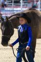 Girl showing her 4-H blue ribbon winning horse at the Western Idaho Fair in Boise, Idaho.