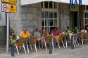 People dine outdoors at a bar in the town of Lekeitio in the province of Biscay, Basque Country, Northern Spain.